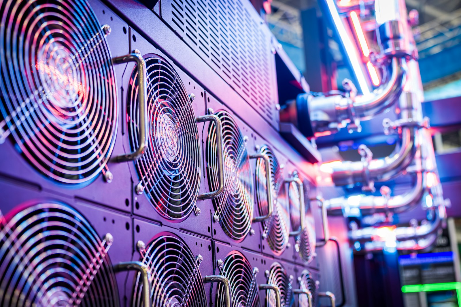 Close-up of server cooling fans in a vibrant data center