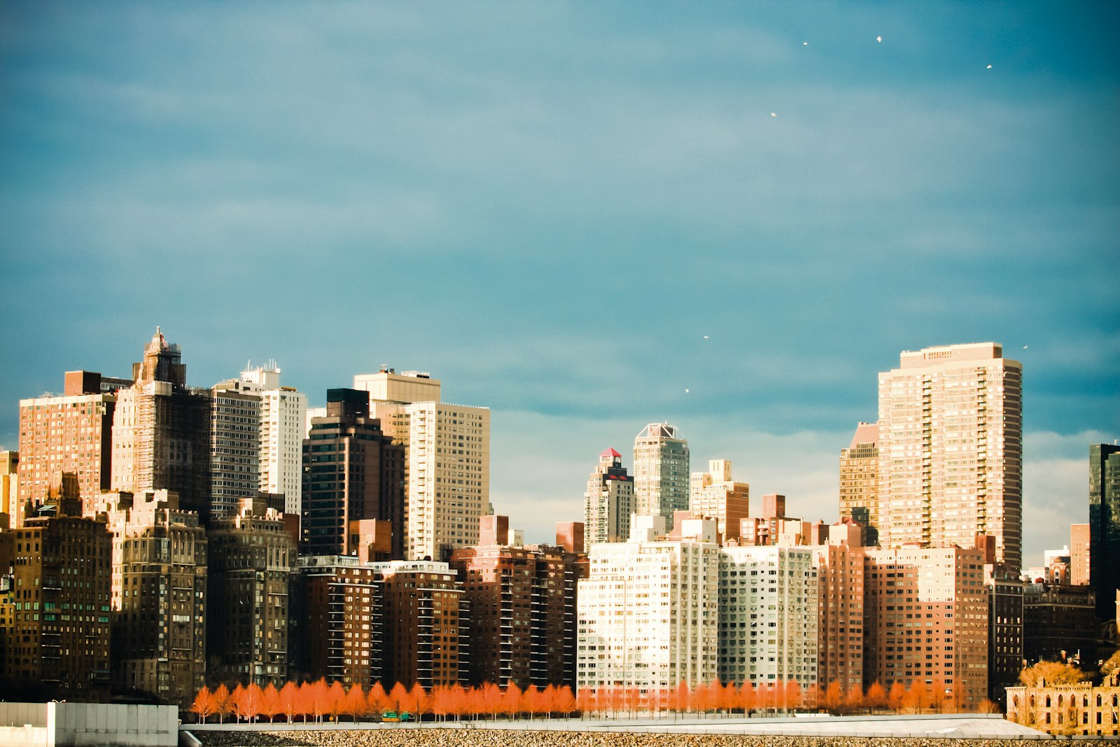 Concrete buildings under cloudy sky