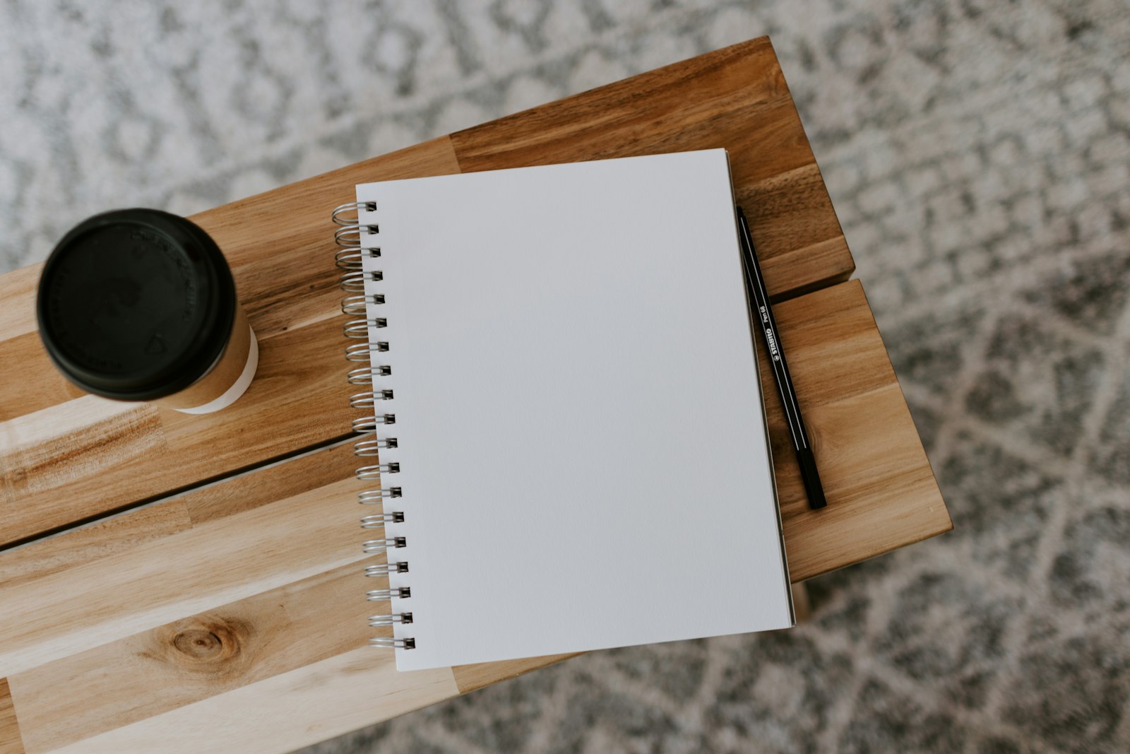 White printer paper on brown wooden table